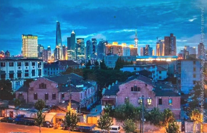 A picture containing building, outdoor, city, light

Description automatically generated