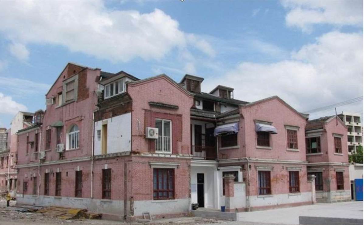 A row of pink buildings

Description automatically generated with low confidence