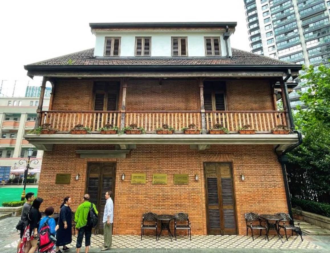 A picture containing building, outdoor, brick, house

Description automatically generated