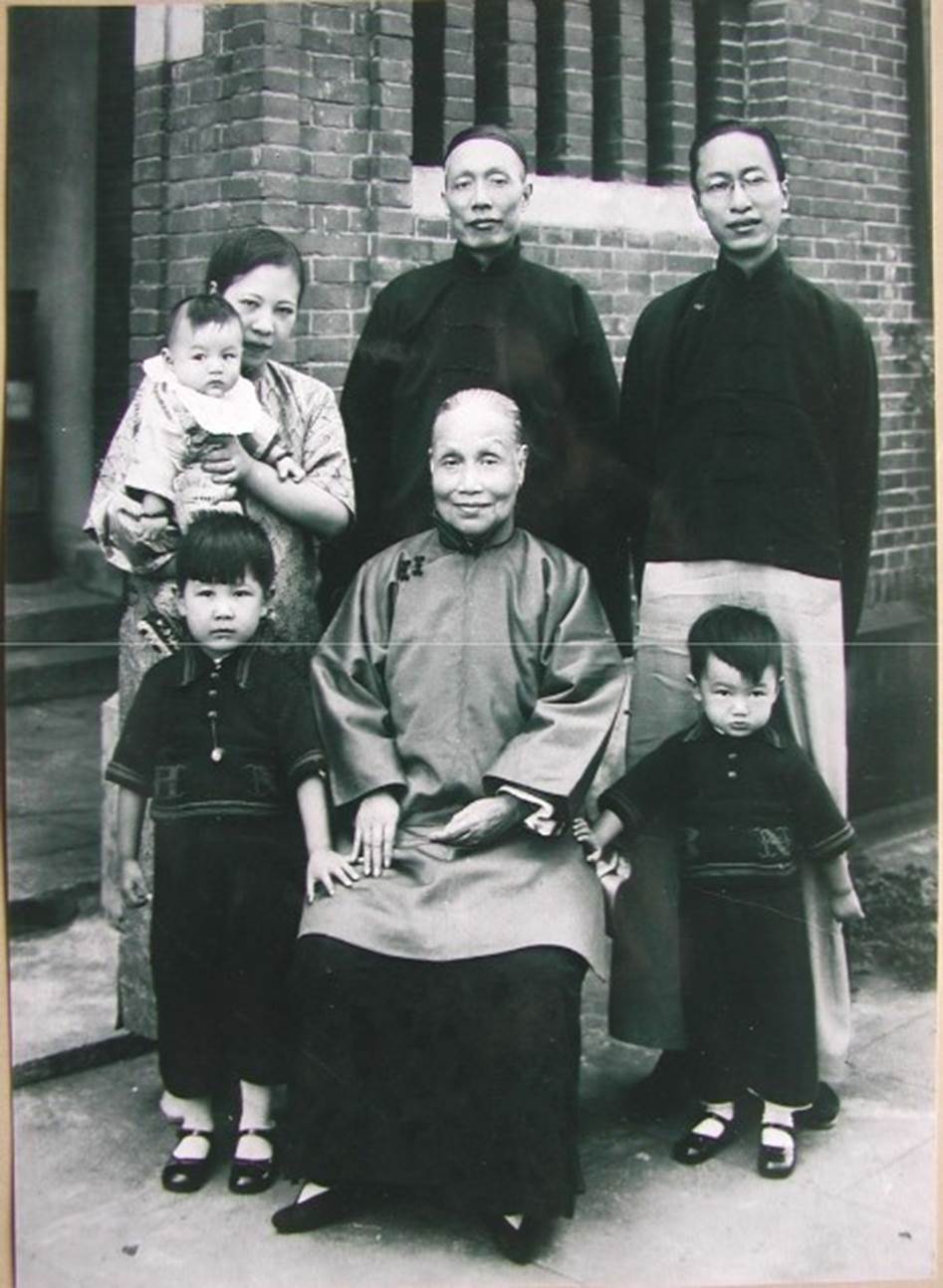 A group of people posing for a photo

Description automatically generated